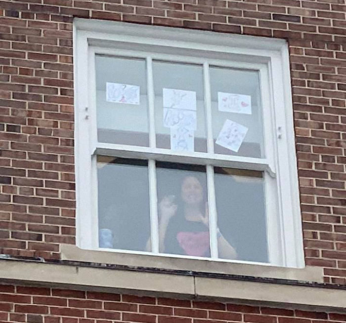 Husband Sets Up Weekly Date Nights Outside Hospital Window As His Wife Waits To Give Birth