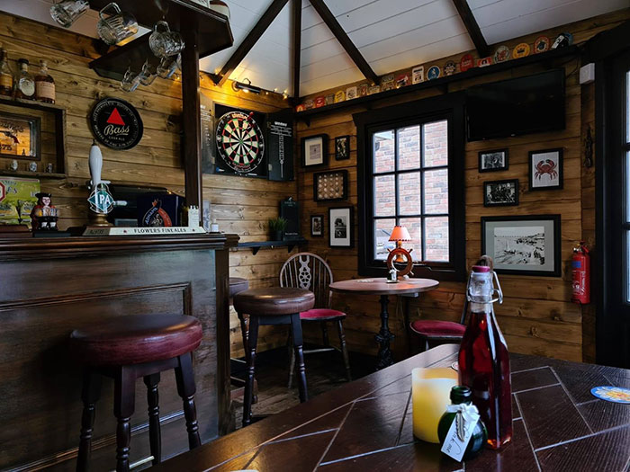 Couple Builds A Mini Pub In A Garden, Stuns People With Its Handmade Interior